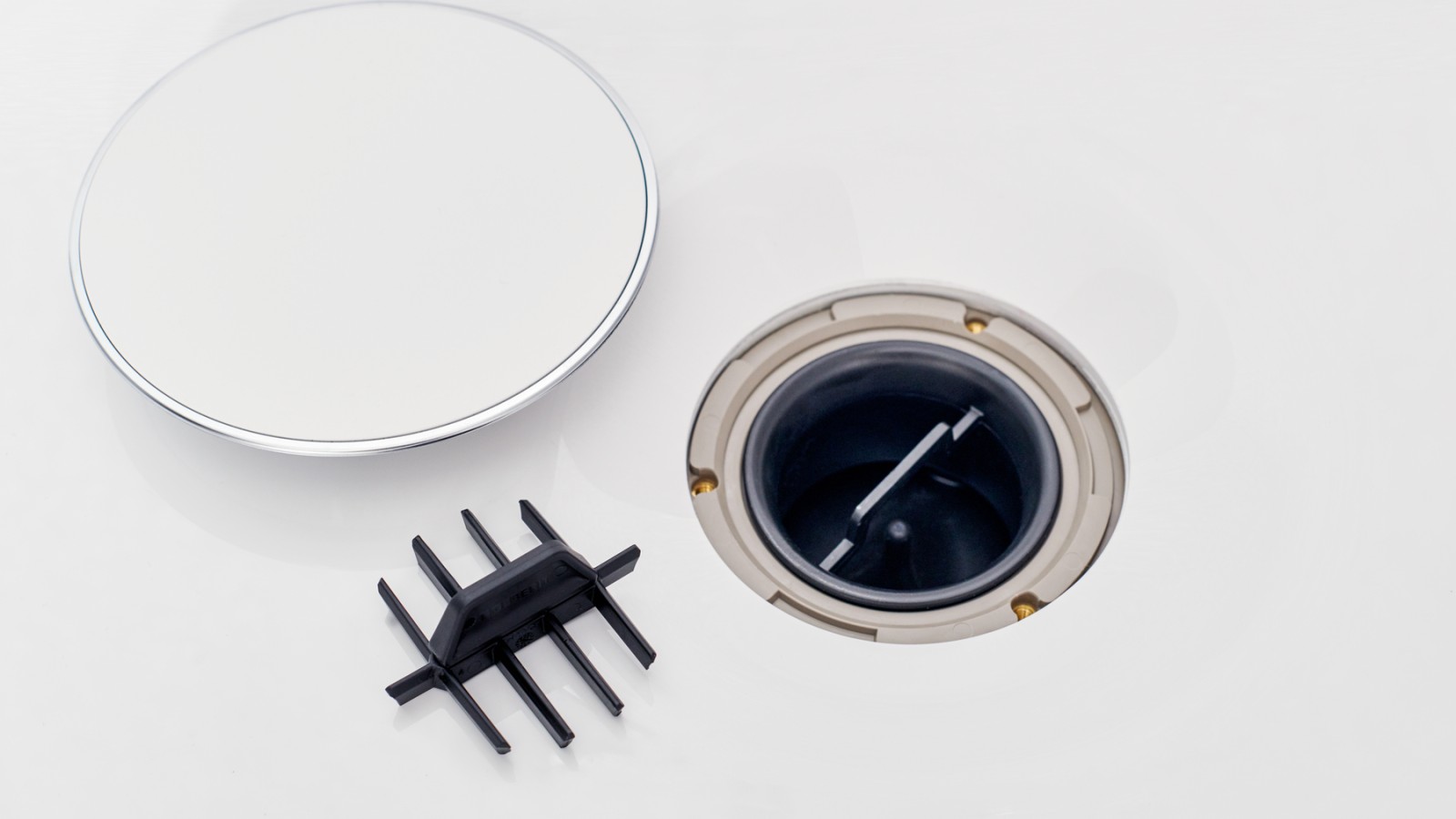 Vložek v obliki glavnika v odtoku Vložek v obliki glavnika v odtoku