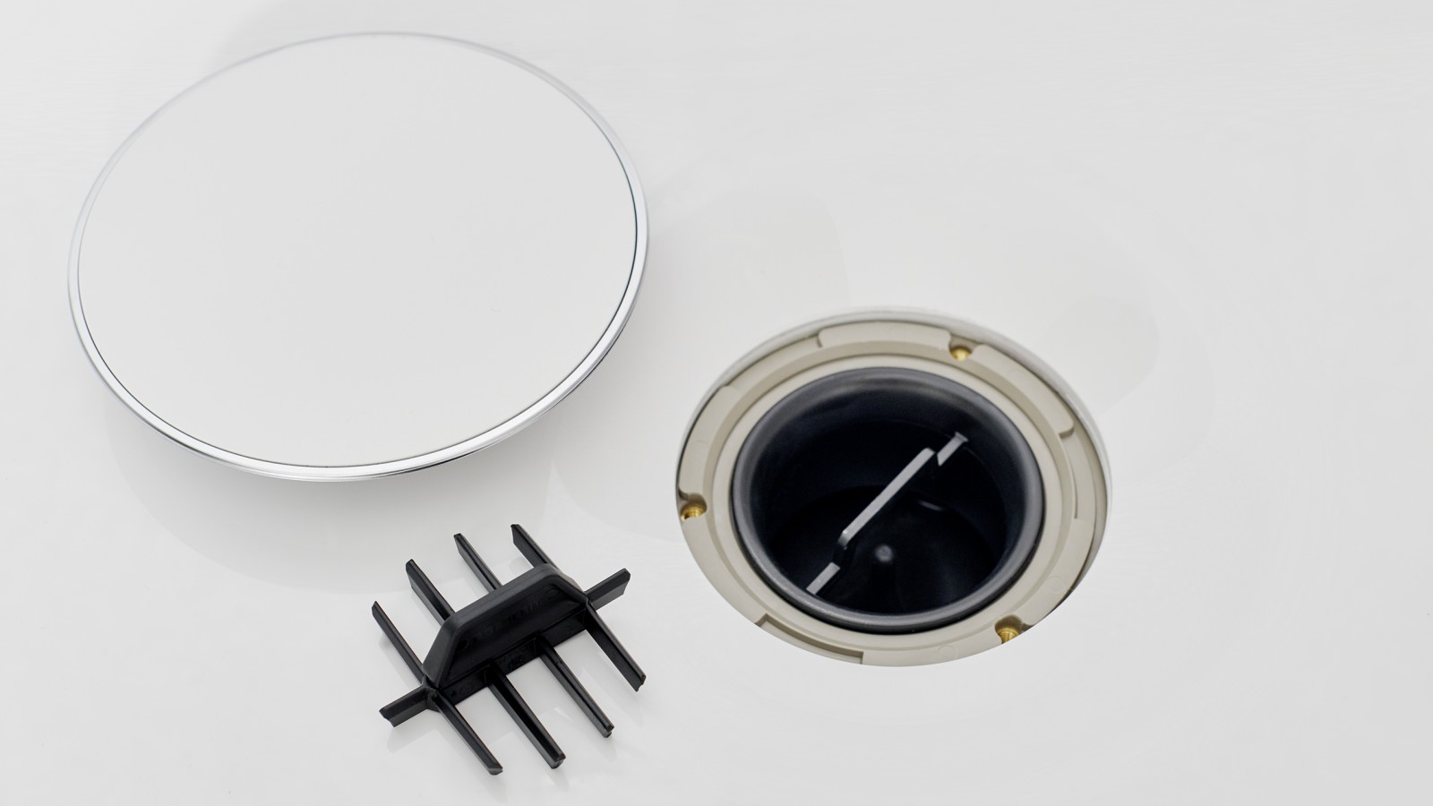 Pokrov odtoka in nastavek z glavnikom Pokrov odtoka in nastavek z glavnikom